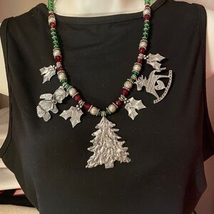 Beautiful signed pieces by Marcie.
Glass beads pewter charms